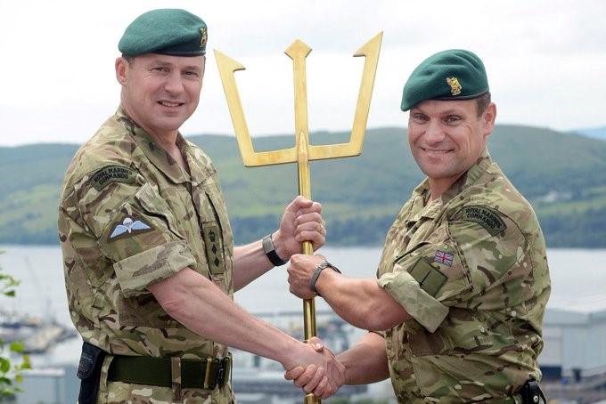 Brigadier Matt Pierson (left) handing over to his successor at 43 Cdo, with HMNB Faslane in the background